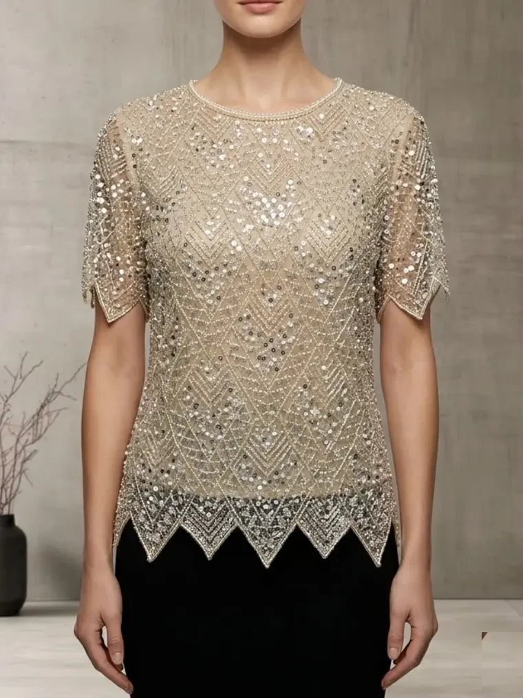 Blusa dorada bordada